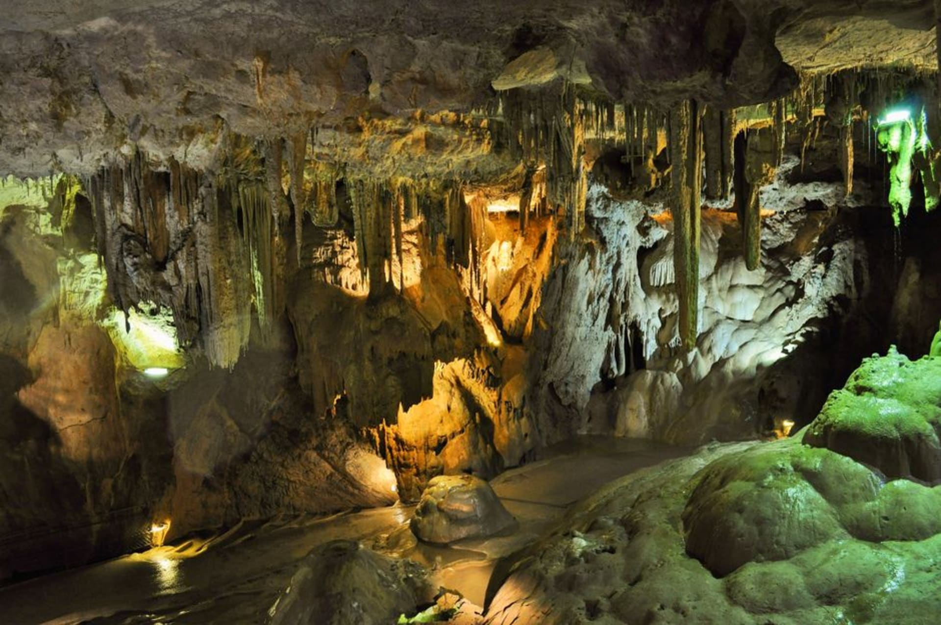 Illuminated stalactite chamber deep inside the Grotte di Castellana cave system in Puglia