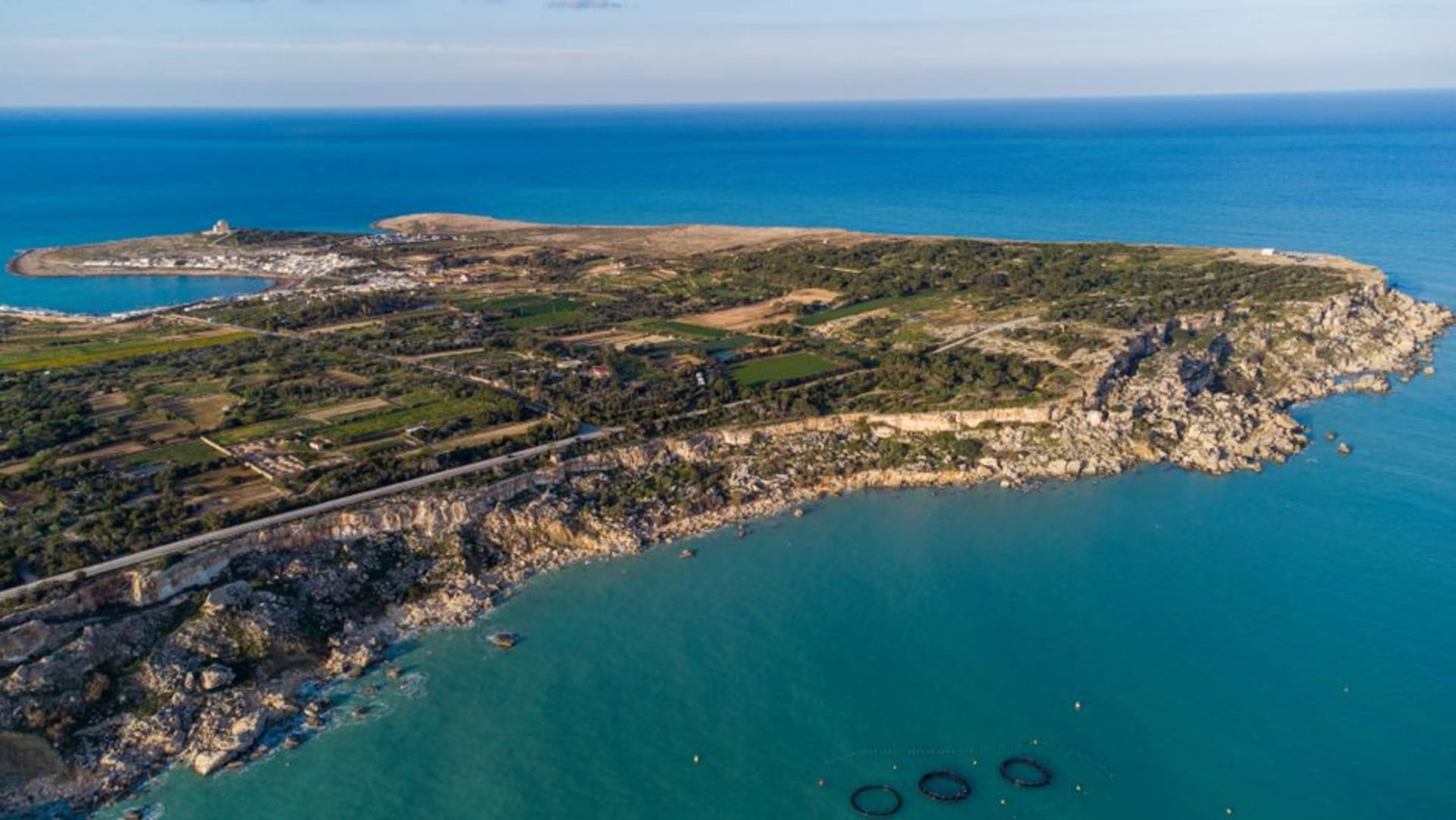 The small marina of San Pietro in Bevagna near Maruggio, fishing boats moored along the Ionian coastline