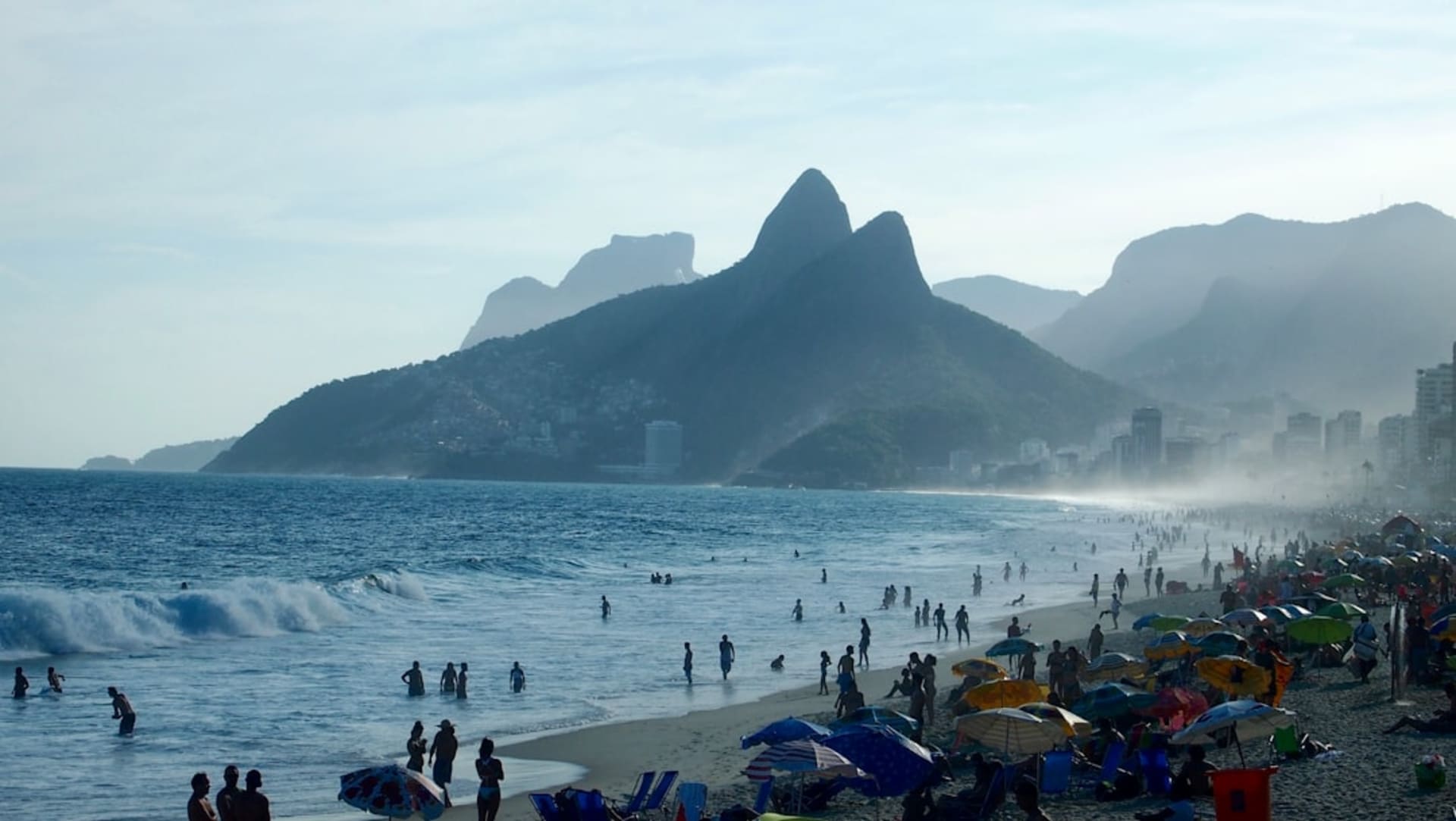 The vast, flat expanse of Praia do Cassino stretching toward the horizon under a wide sky
