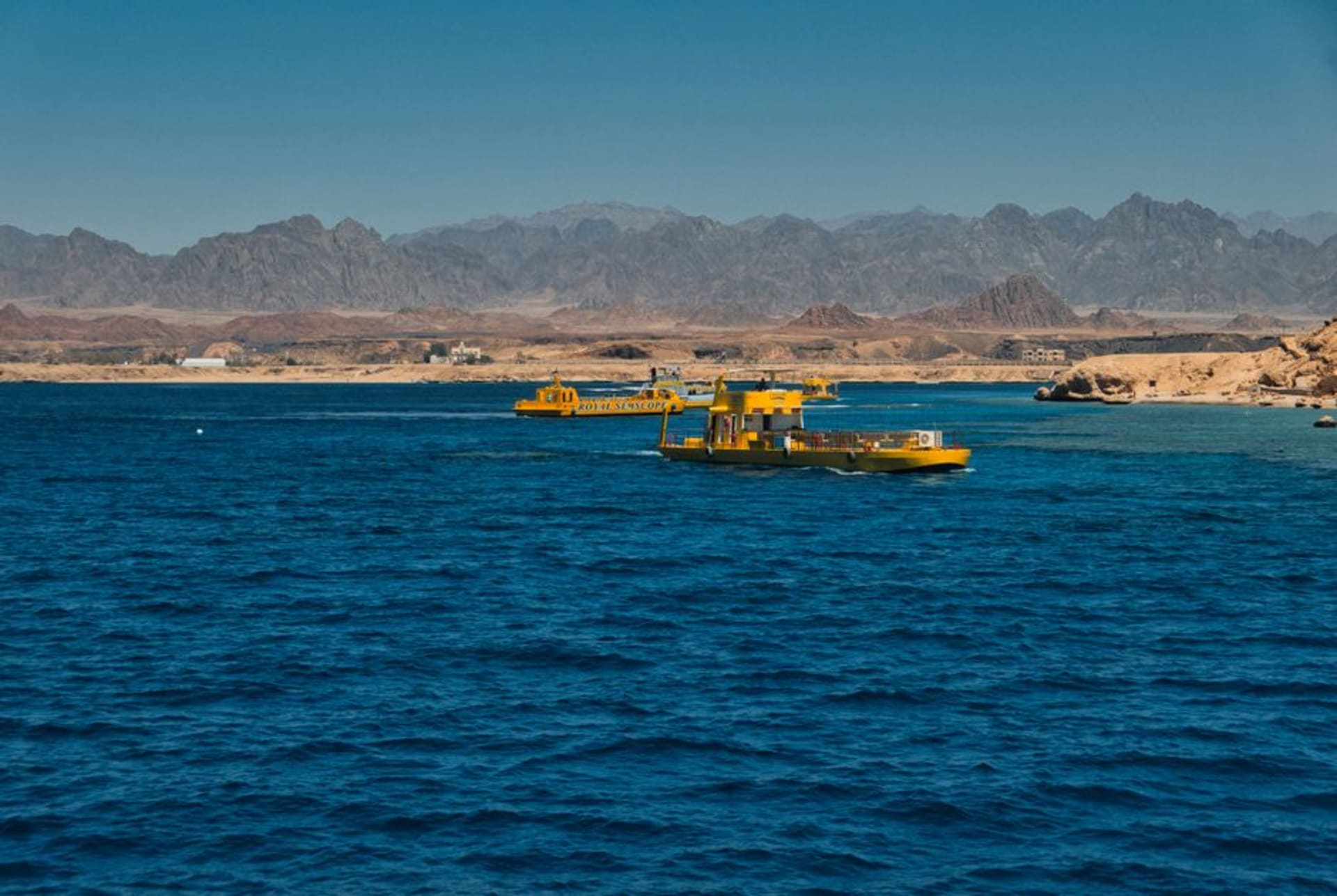 Rugged coastal mountains meeting the turquoise waters of the Gulf of Aqaba at Ras Abu Galum