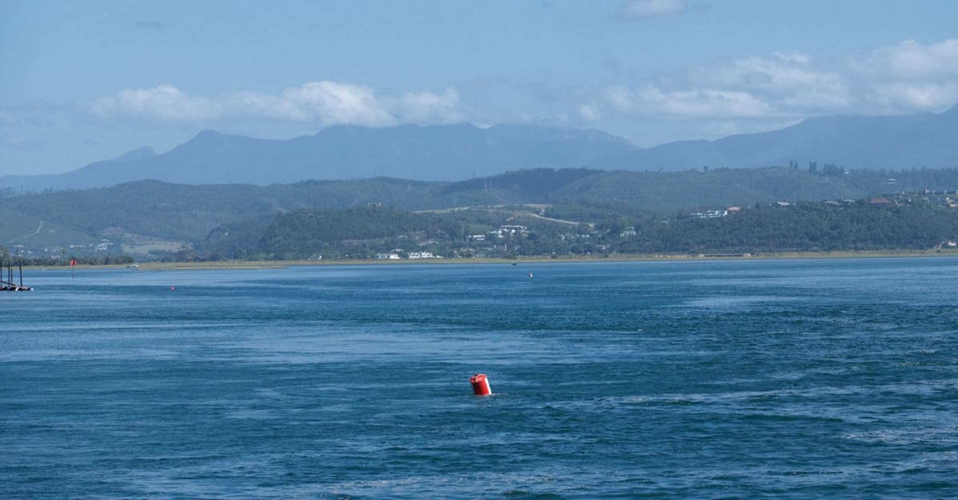 The Knysna Heads sandstone cliffs framing the lagoon entrance at golden hour