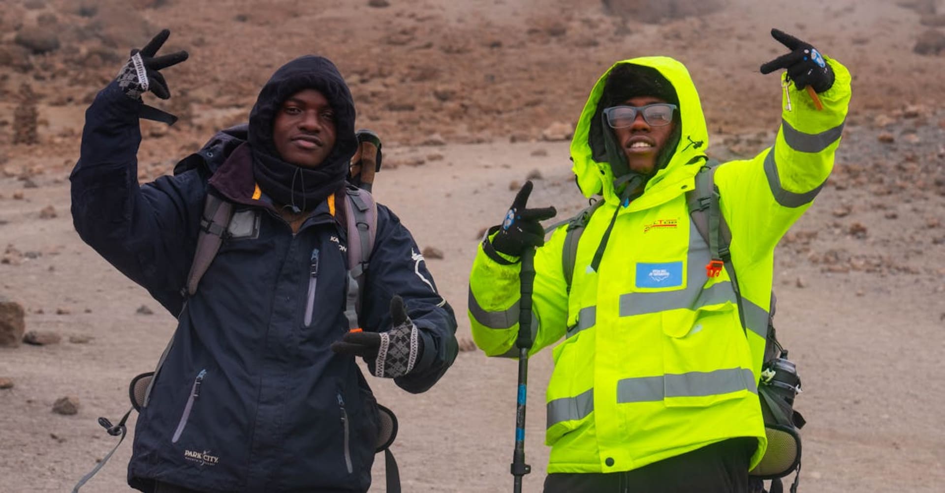 Snow-capped summit of Mount Kilimanjaro rising above the clouds at dawn