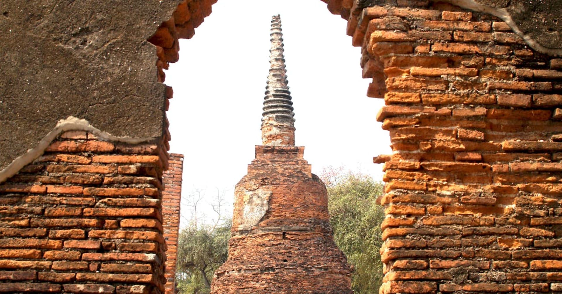 Ancient brick stupas and Buddha statues in Ayutthaya Historical Park