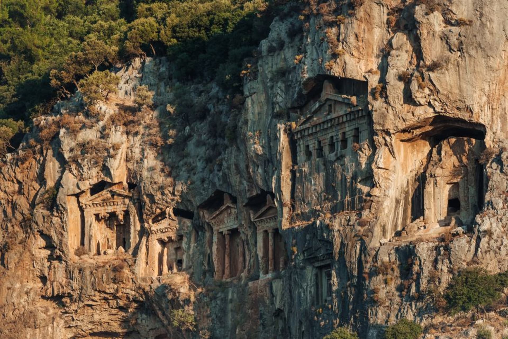 The Lycian rock tombs of Dalyan carved into the cliff face above the river