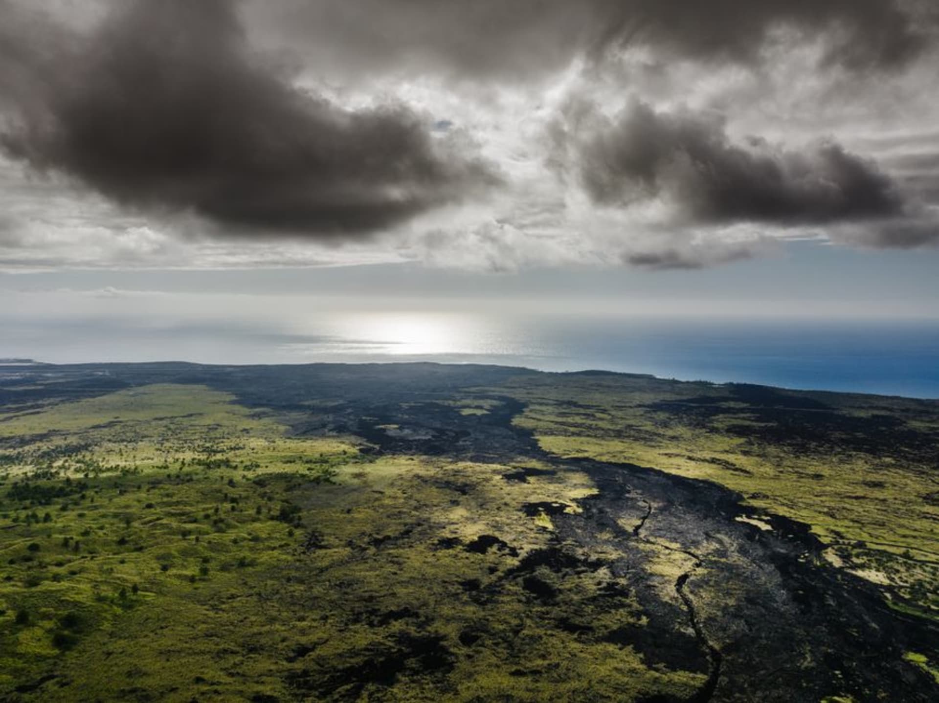 Glowing lava and steam at Kilauea volcano in Hawaii Volcanoes National Park