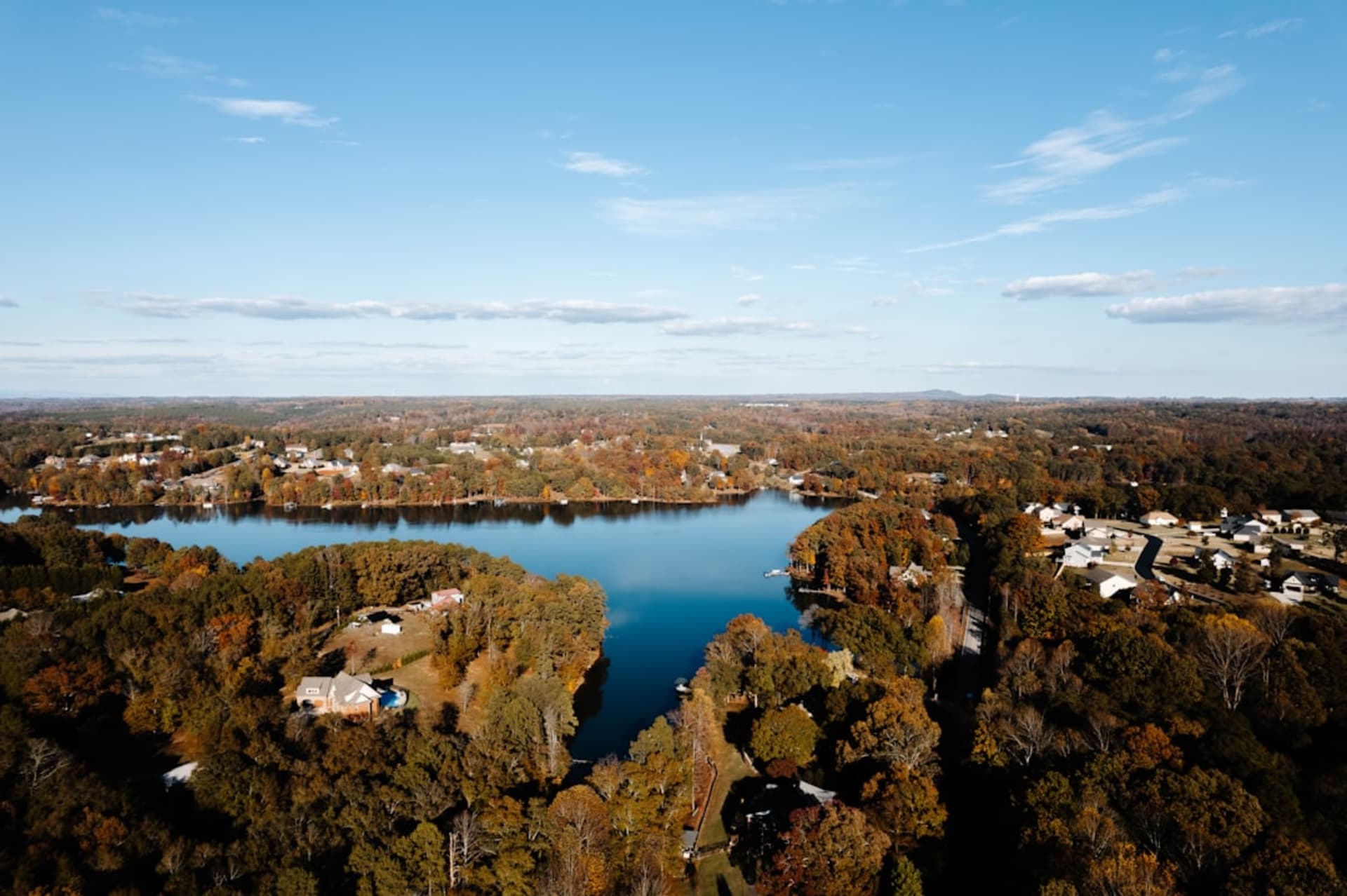 Tillman Hall clock tower on Clemson University's campus overlooking Lake Hartwell in South Carolina