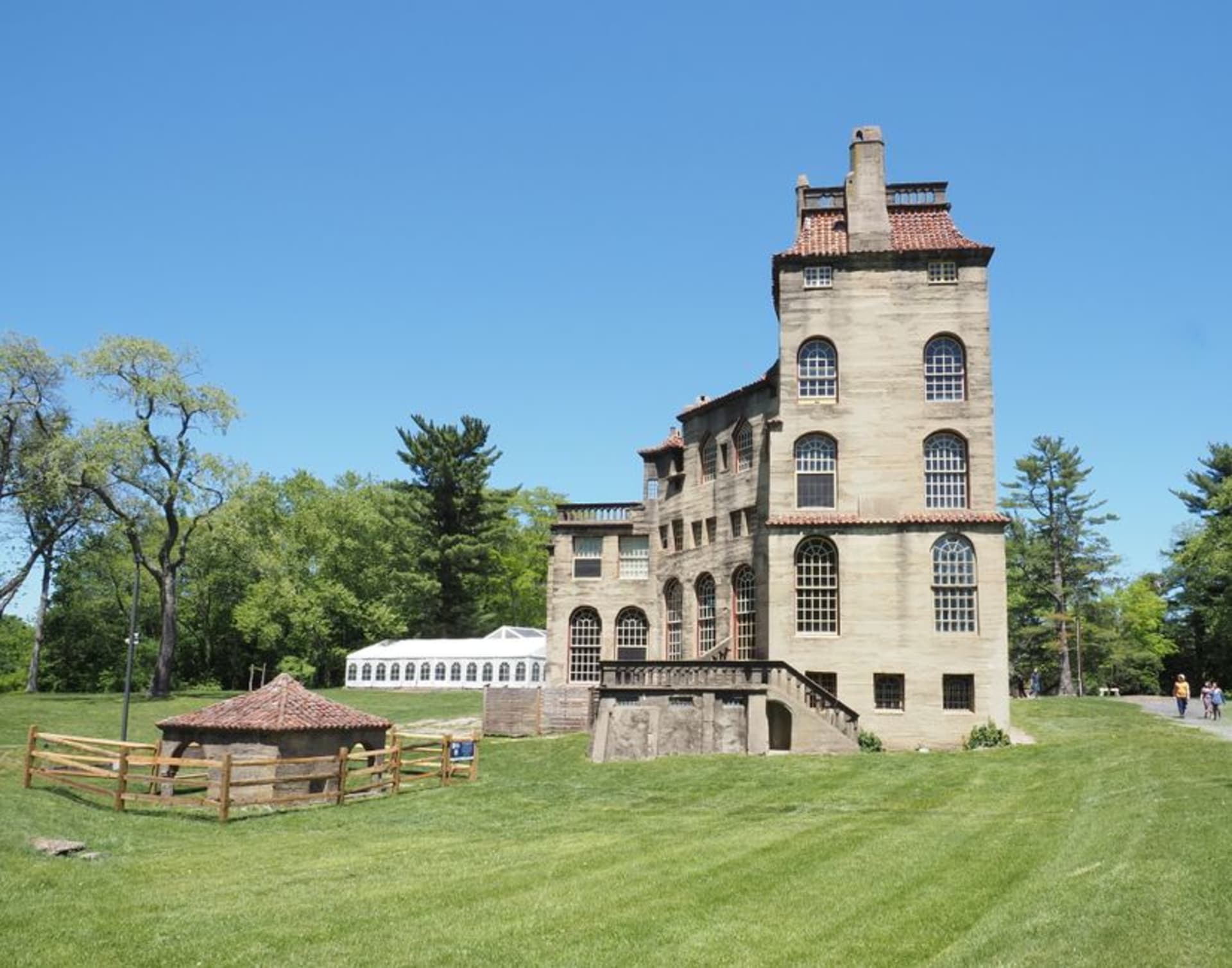The turreted concrete facade of Fonthill Castle rising above the trees in Doylestown, Pennsylvania