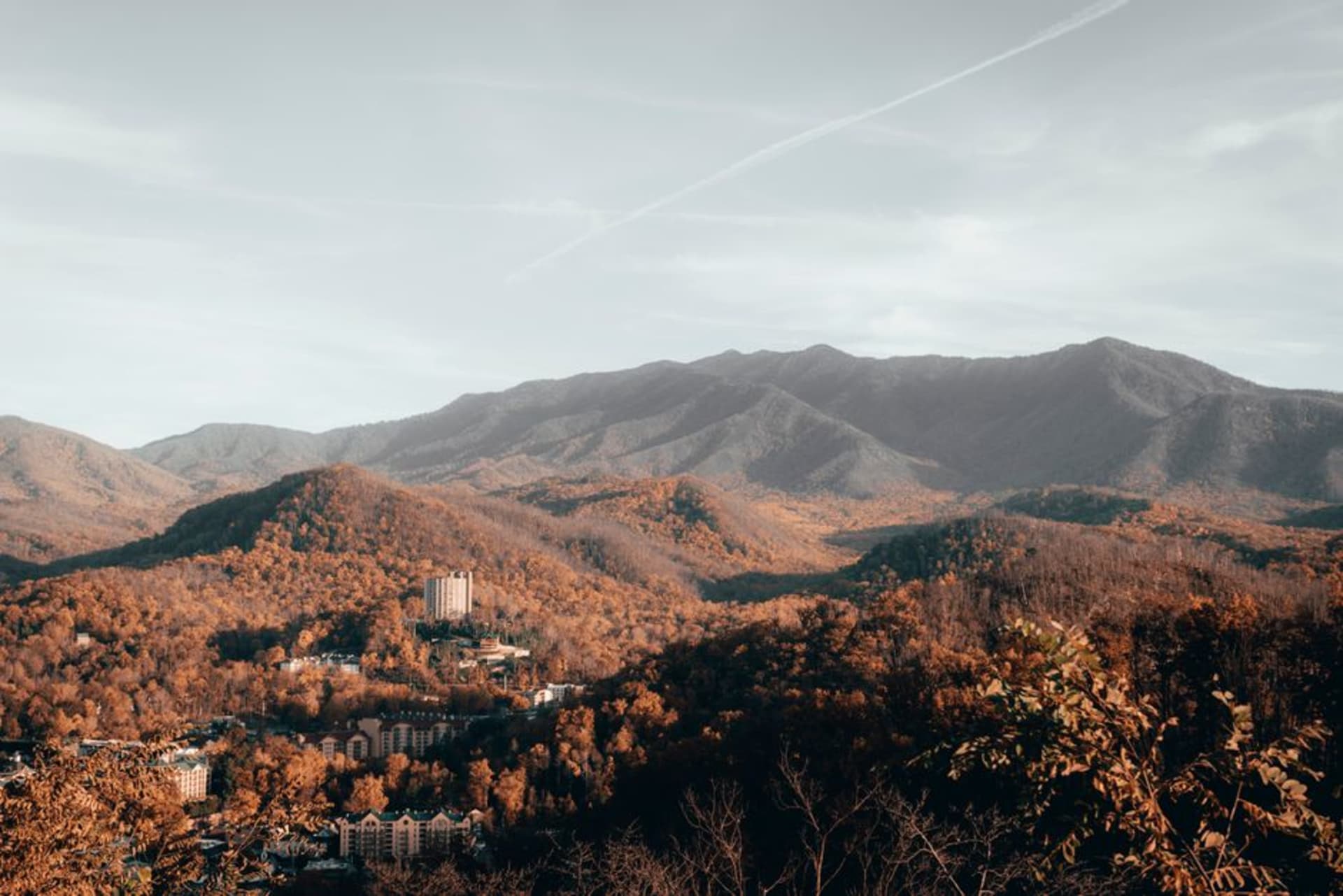 Mist rising over layered blue ridges of the Great Smoky Mountains above Gatlinburg