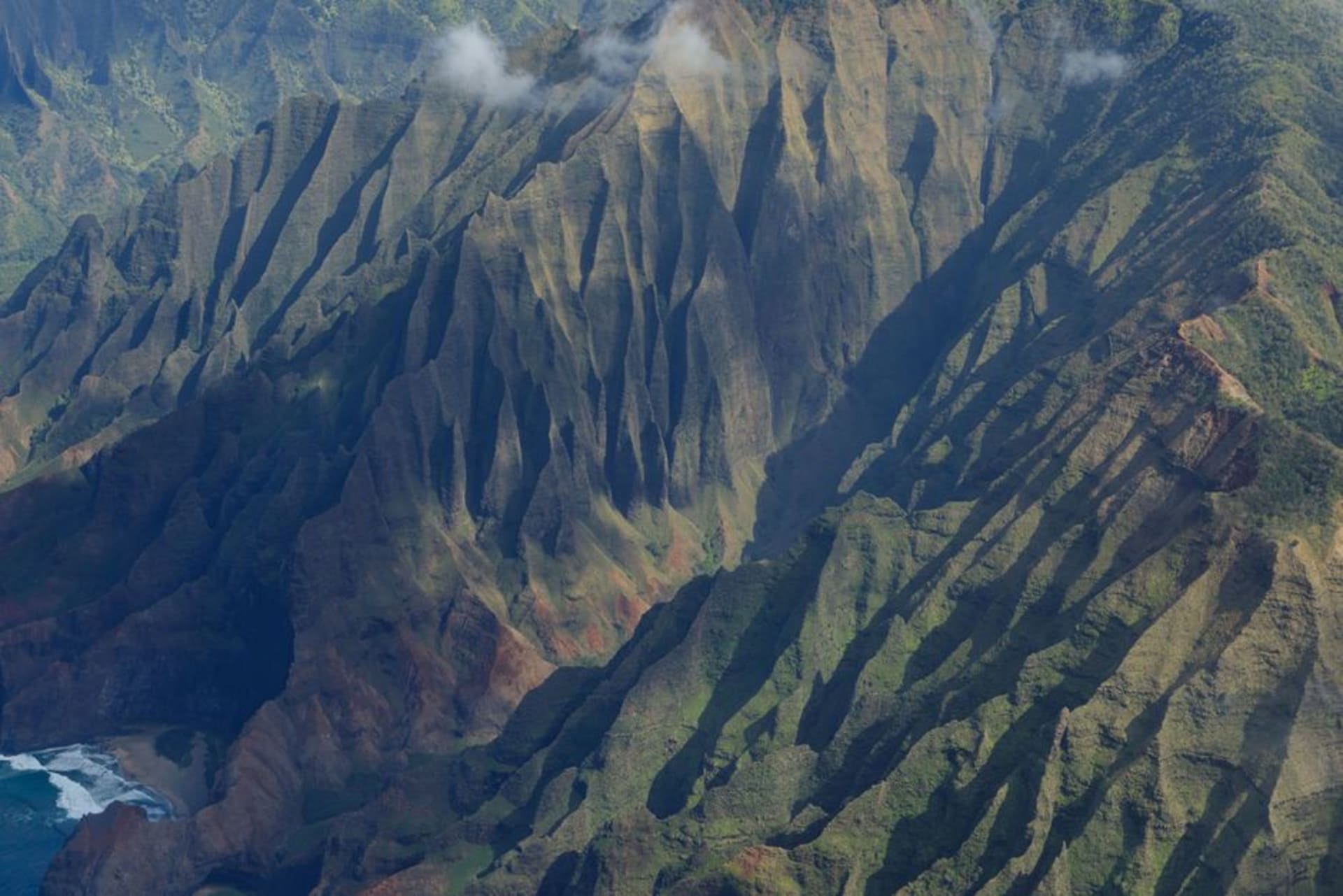 The fluted green sea cliffs of the Na Pali Coast on Kauai