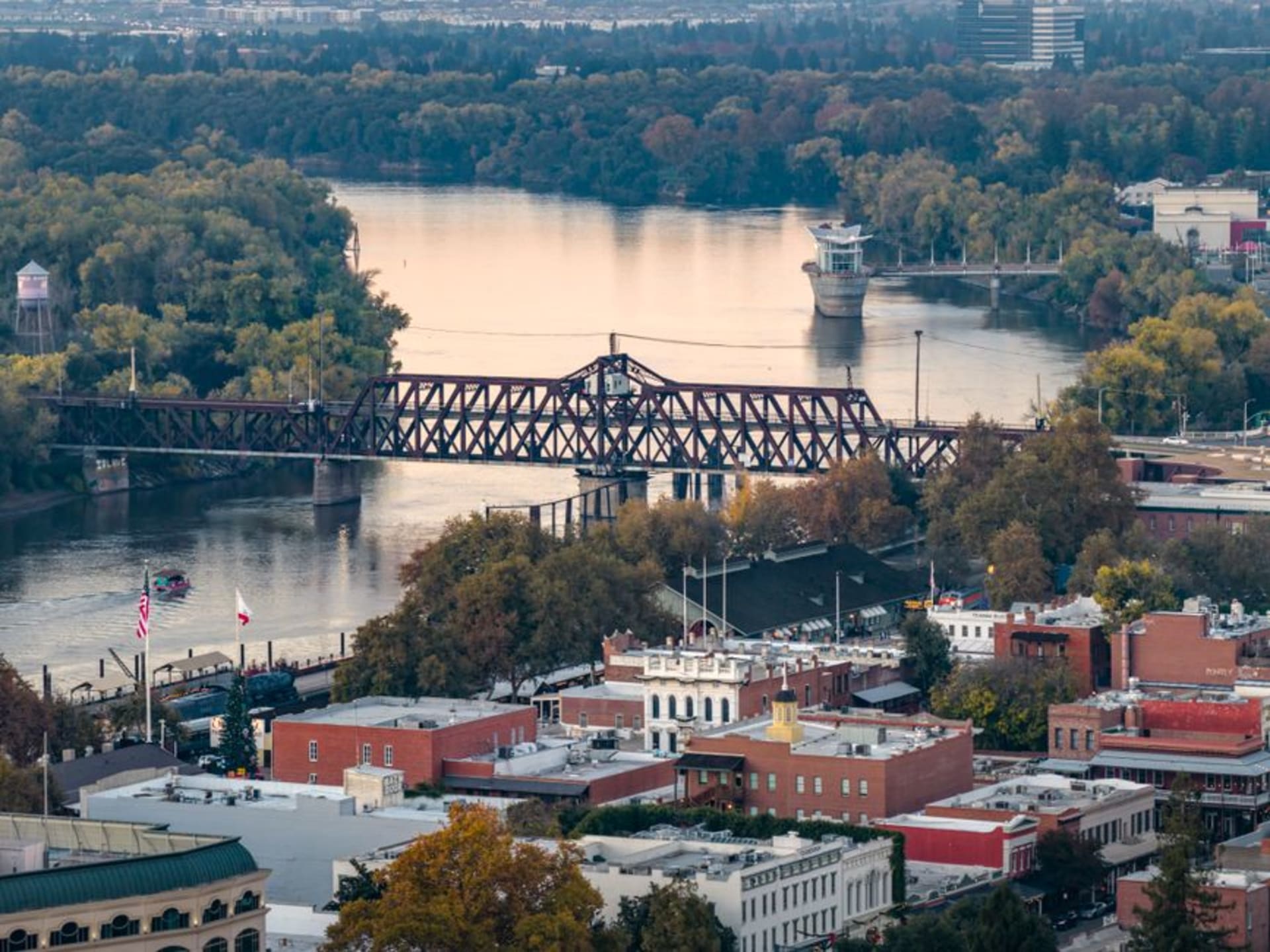 The Arkansas River waterfront and skyline of Little Rock at dusk
