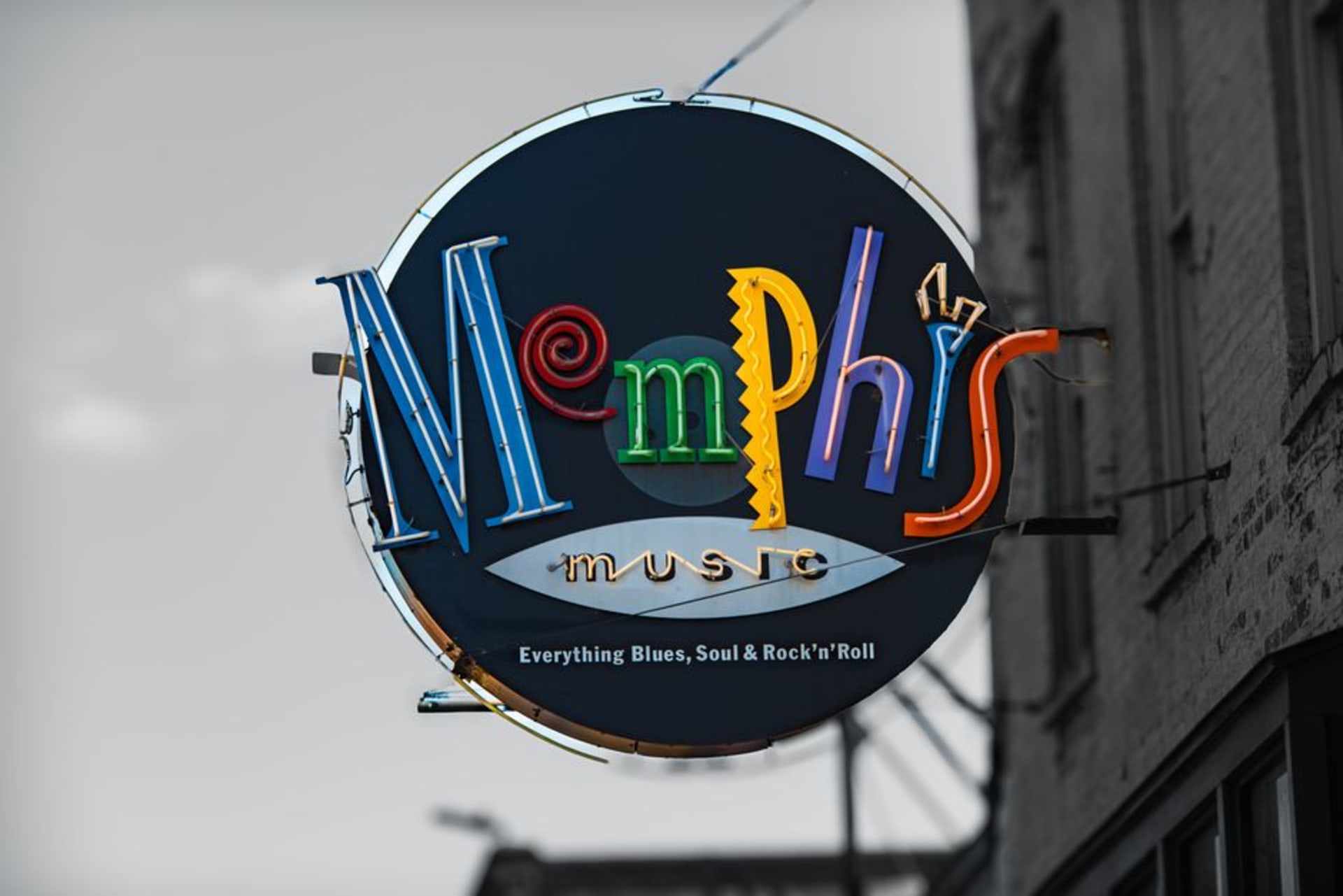 Beale Street at night ablaze with neon signs and music-club marquees