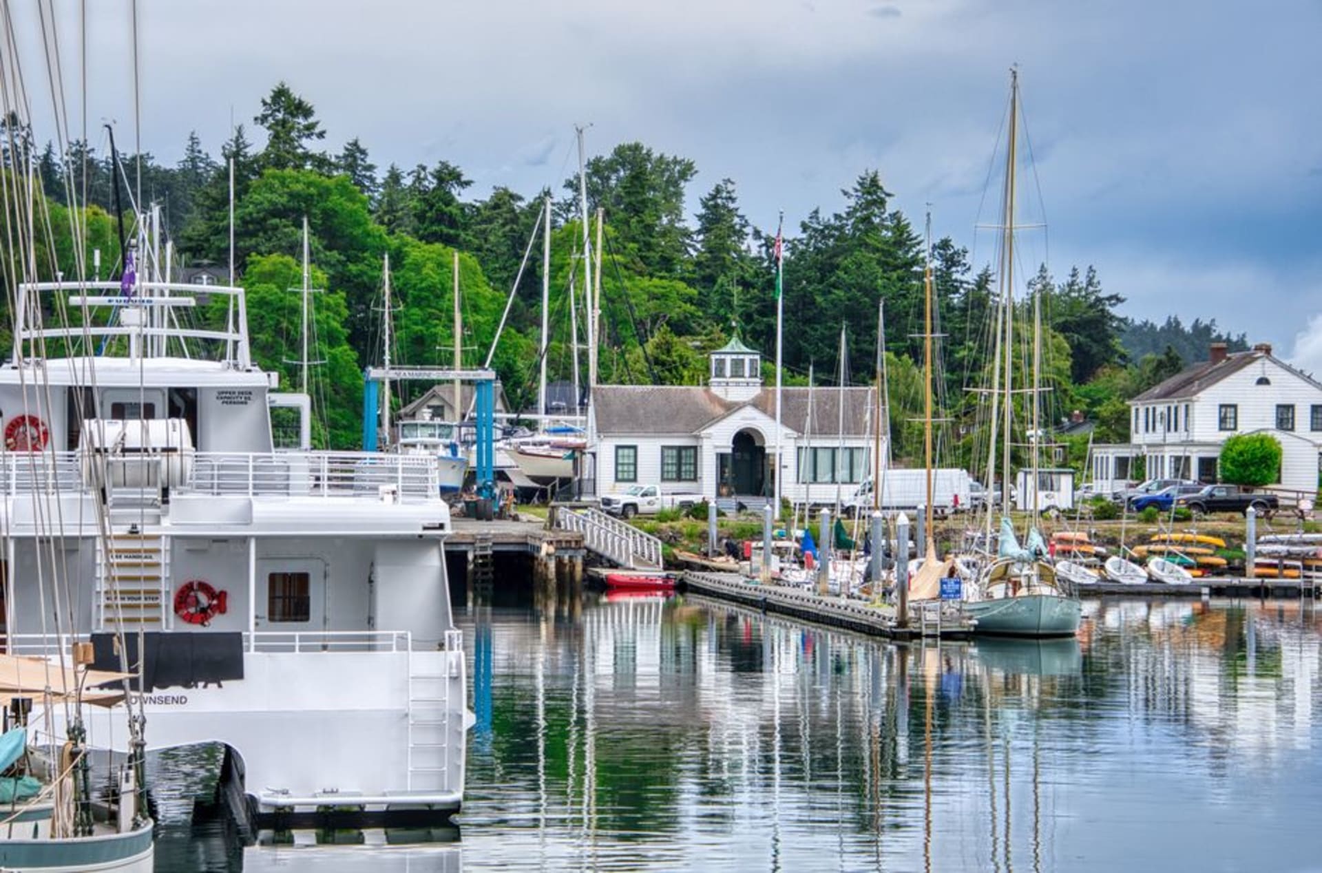 Victorian brick buildings along Water Street in Port Townsend with the bay behind