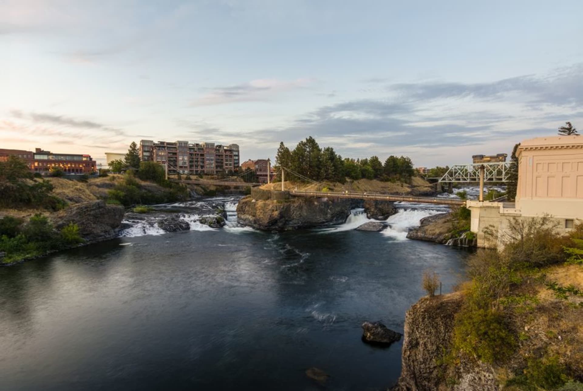 The Spokane River tumbling over the downtown falls beside Riverfront Park in Spokane, Washington