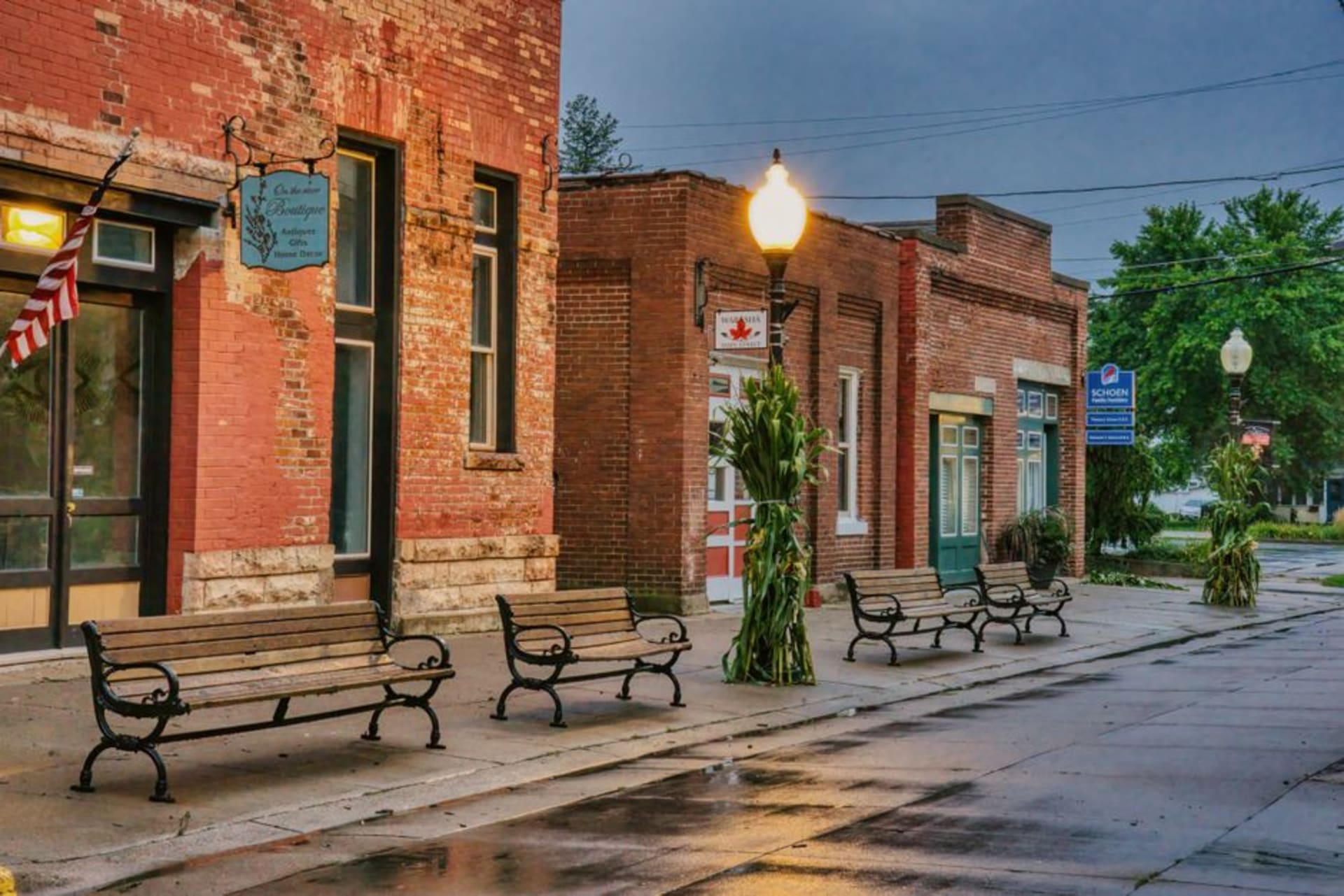Historic brick storefronts and gaslamps along Main Street in Van Buren, Arkansas