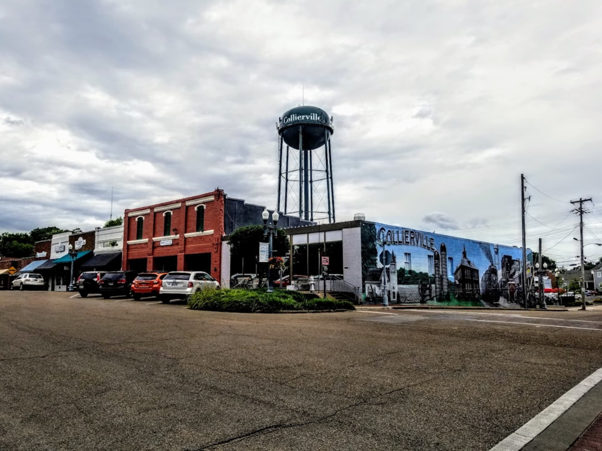 The brick-paved historic Main Street of Zionsville, Indiana lined with boutique storefronts