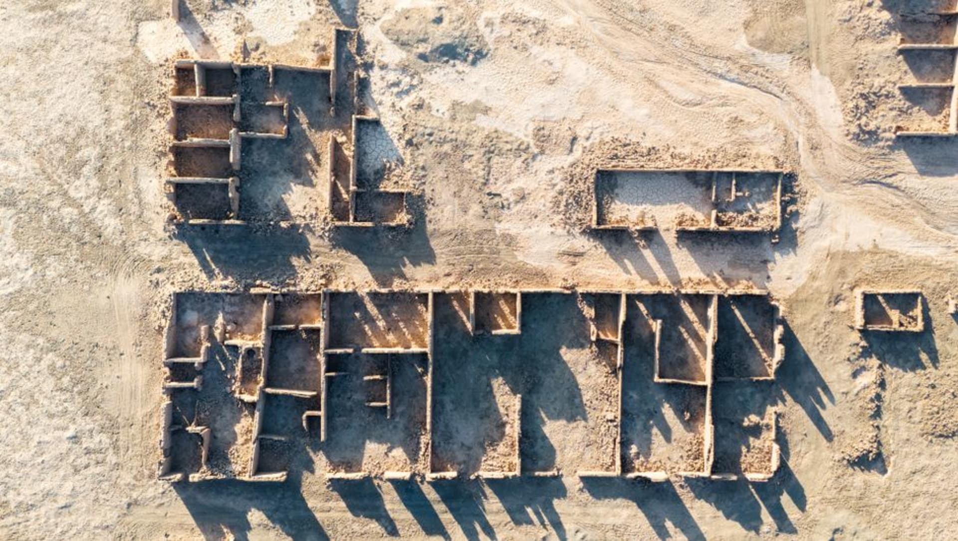 Aerial view of the concentric circular earthworks of Arkaim on the open steppe