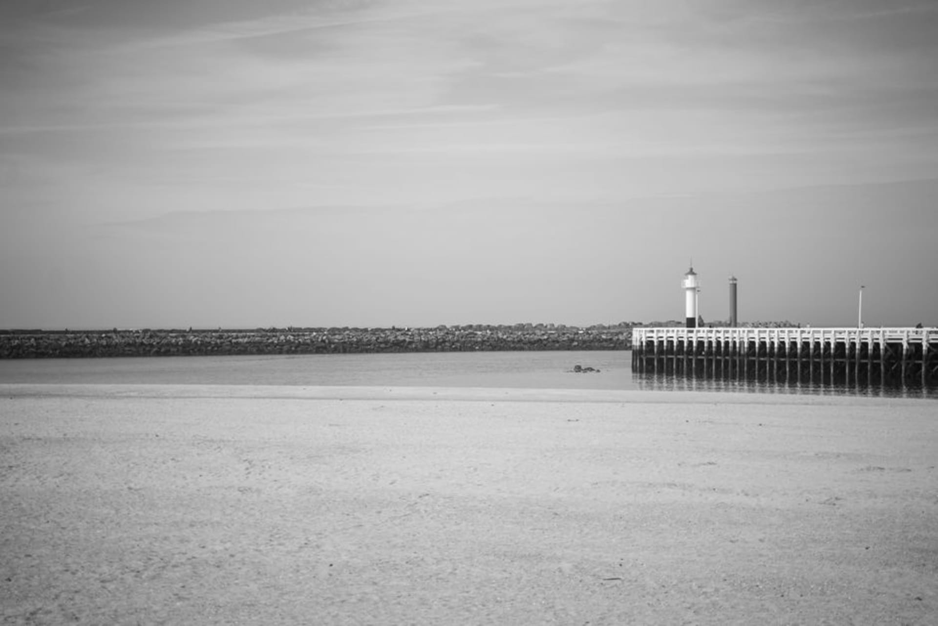 The black-painted Queenscliff lighthouse against a dramatic sky at the entrance to Port Phillip Bay