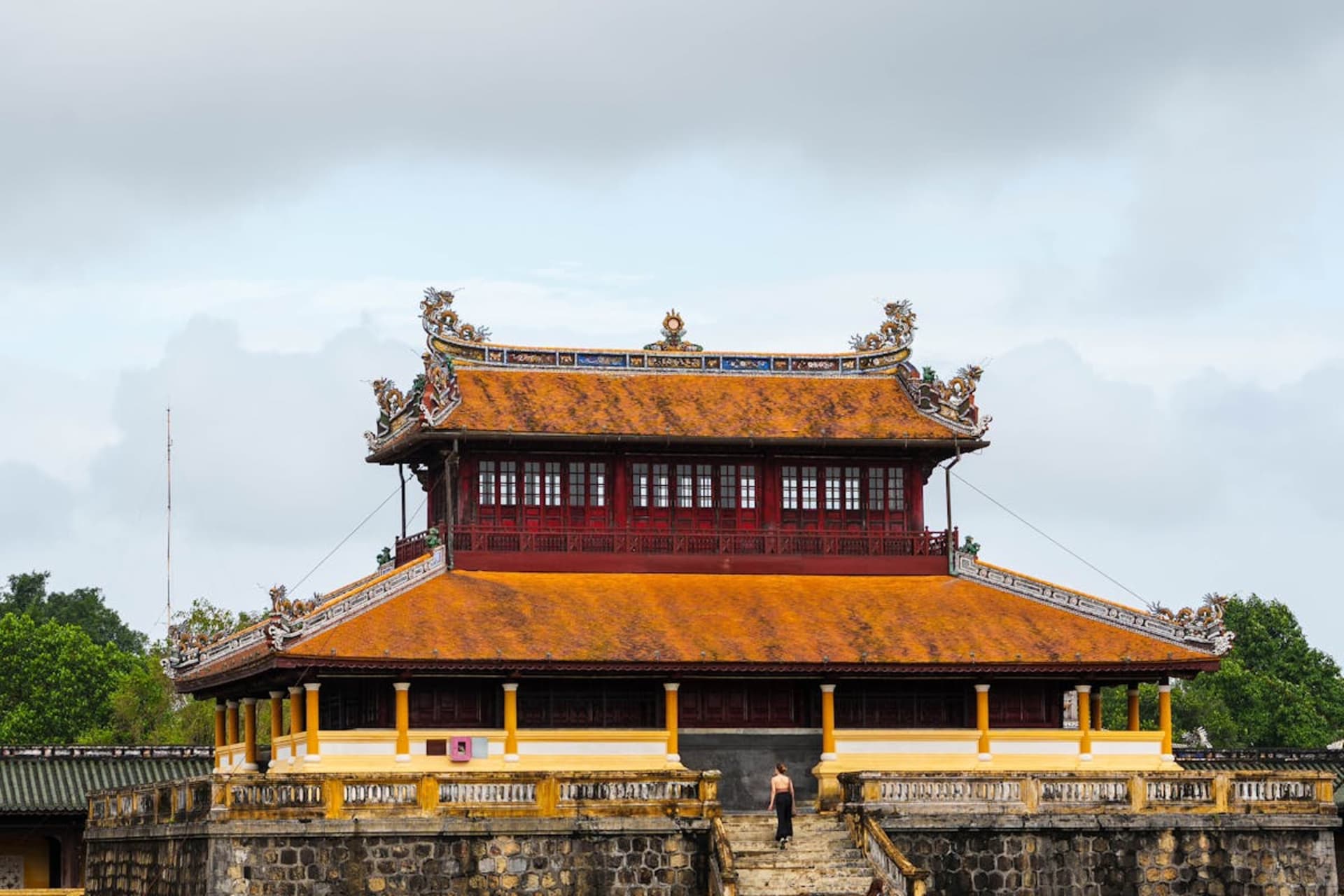 The ornate gate of the Imperial Citadel in Hue reflected in surrounding waters
