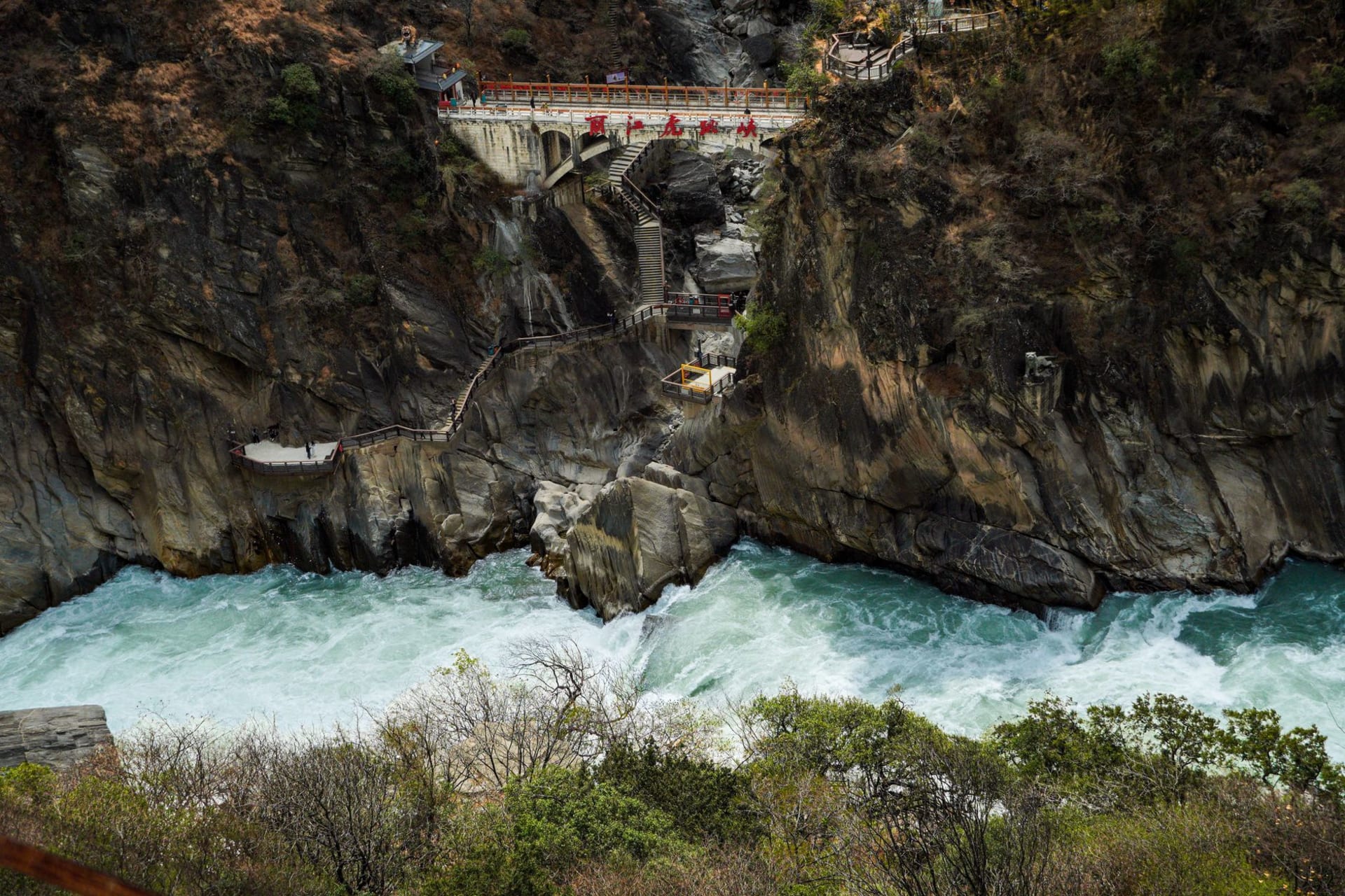 Tiger Leaping Gorge's roaring rapids carved between sheer limestone cliffs, Yunnan, China