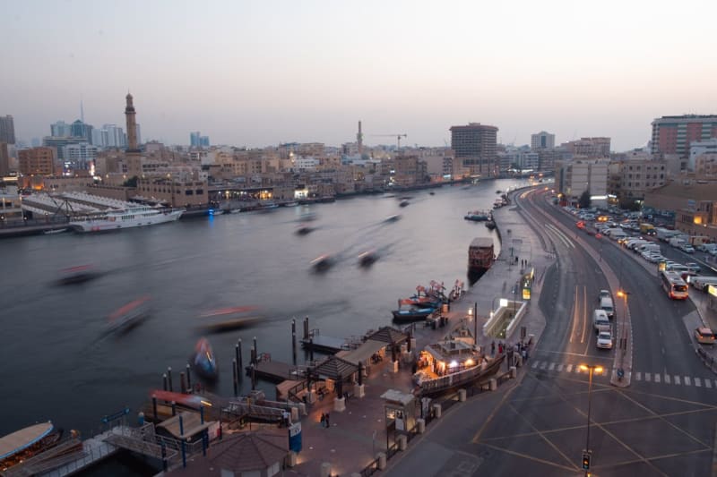 Dubai's Two Cities — The Creek, the Desert, and the Space Between