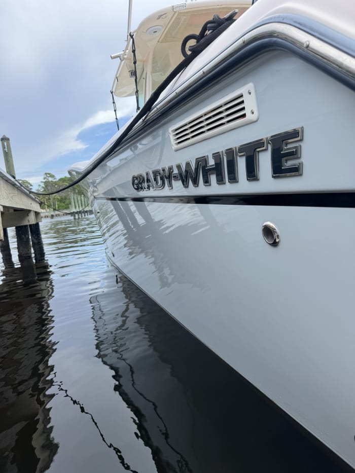 Grady-White boat detail waterline reflection Tampa Bay