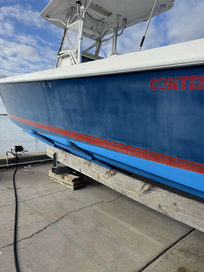 Boat hull before restoration Tampa Bay