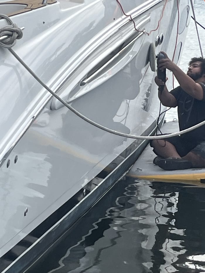 Marine detailing machine polishing yacht hull Tampa Bay