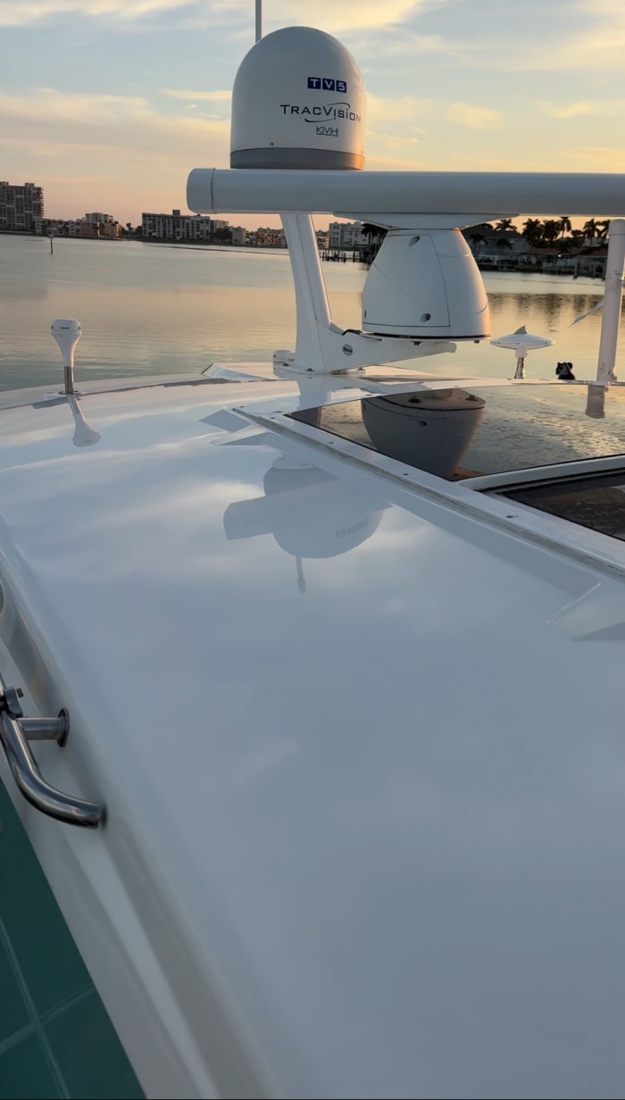 Yacht hardtop polished gelcoat golden hour Tampa Bay