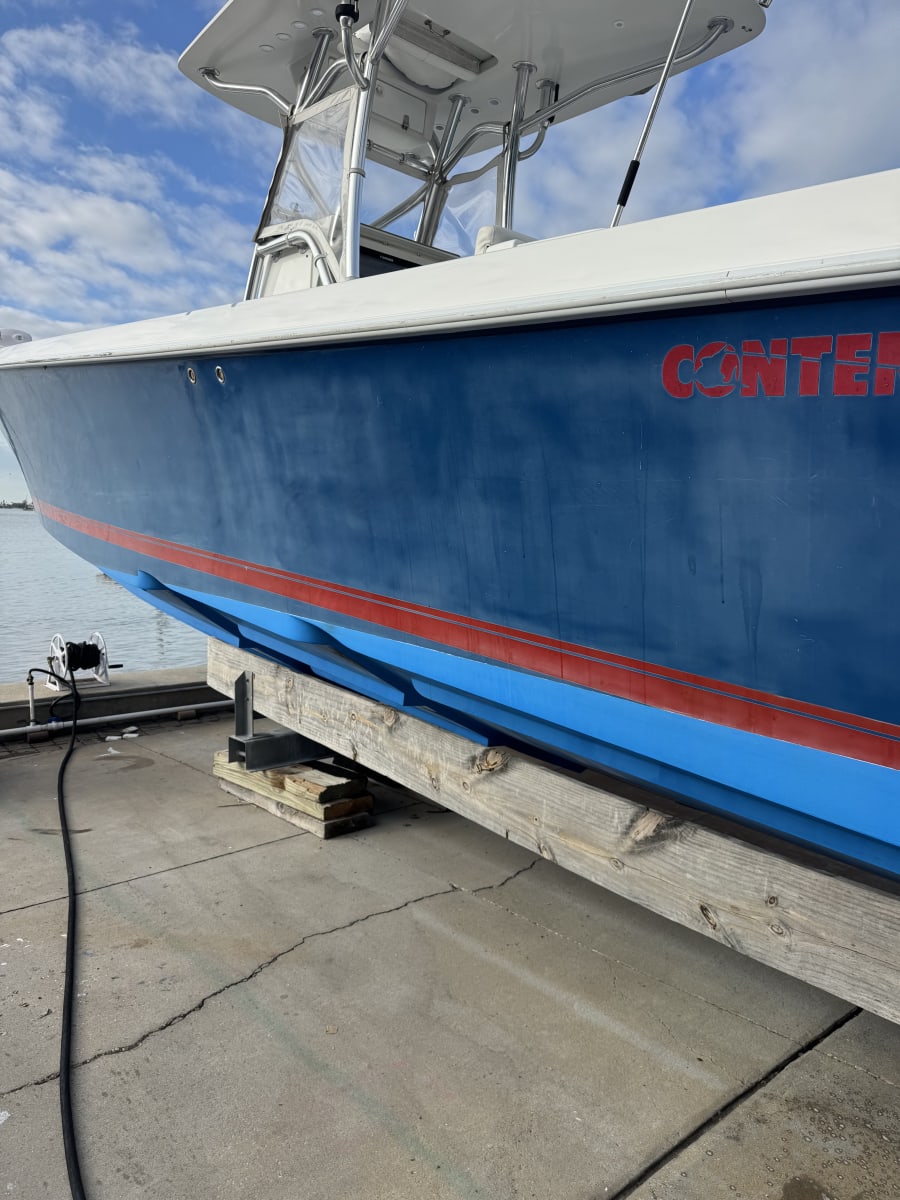 Boat hull before restoration Tampa Bay