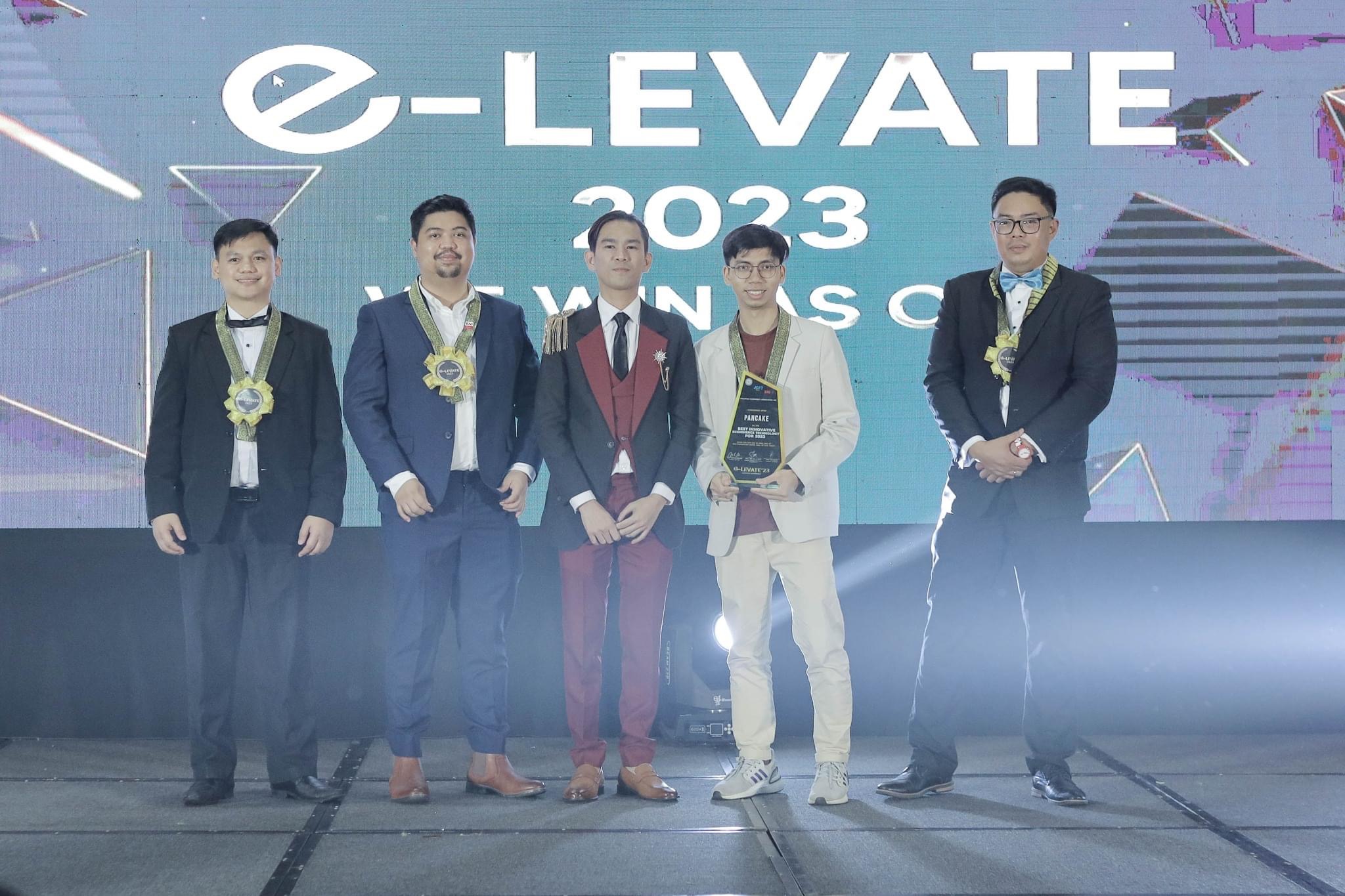 Pham Dong speaking at a large event