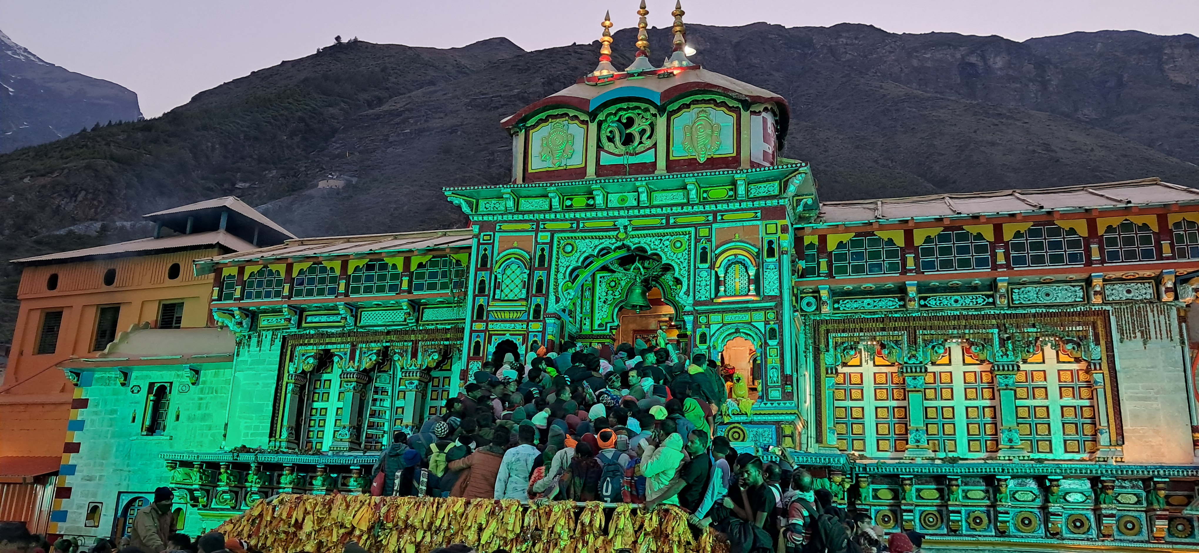 Beautifully lit Badrinath Dham , devotees thronging  through the entrance