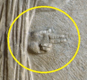 Relief sculpture from the Rome area. Gladiator about to kill a defeated opponent. Detail of the hand showing the ‘thumbs up’