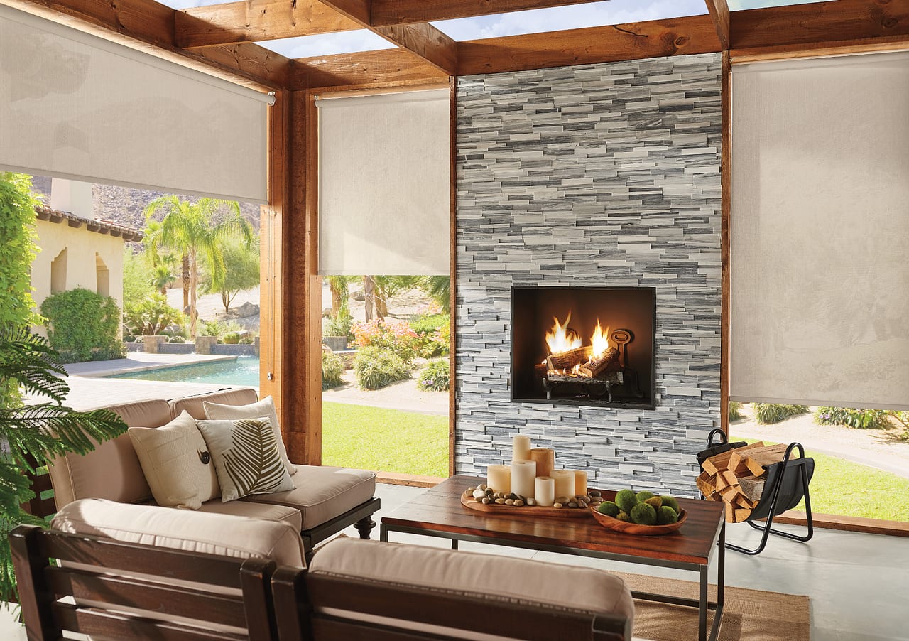 Exterior shades protecting a patio from sun glare