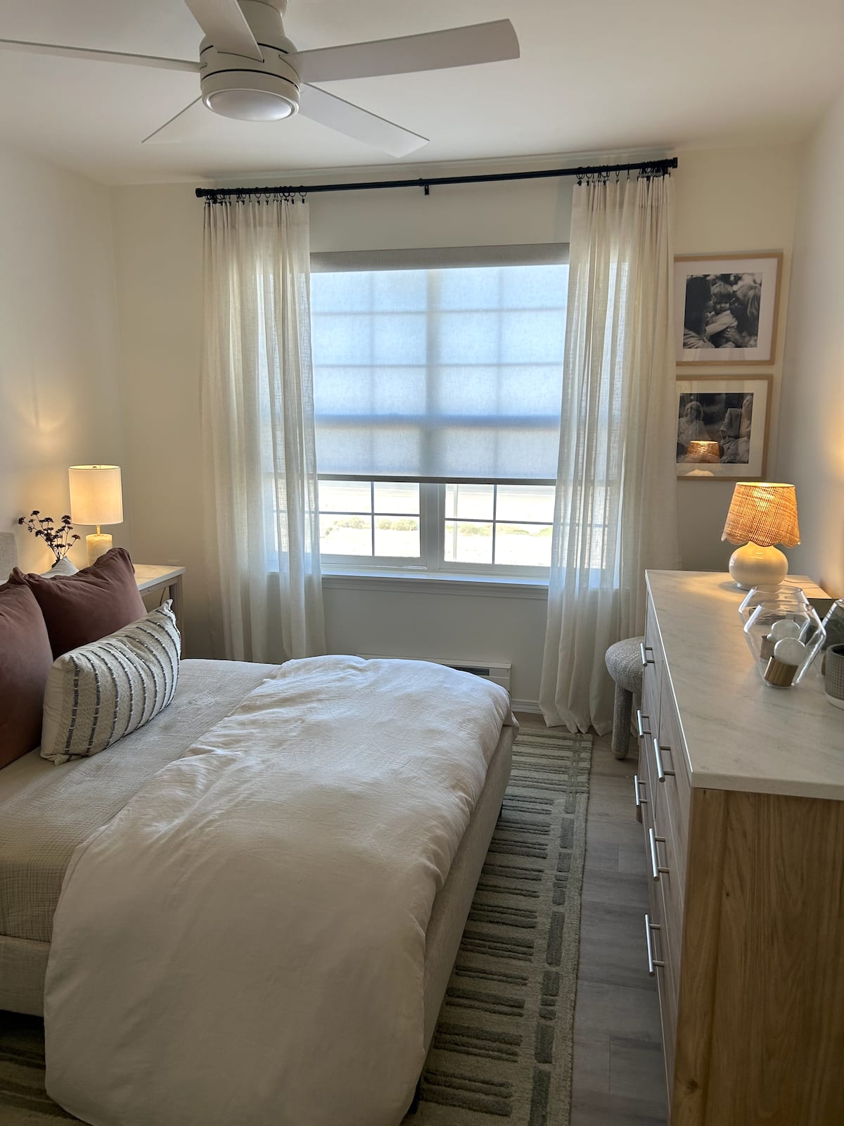 Roller shades in four windows inside country club