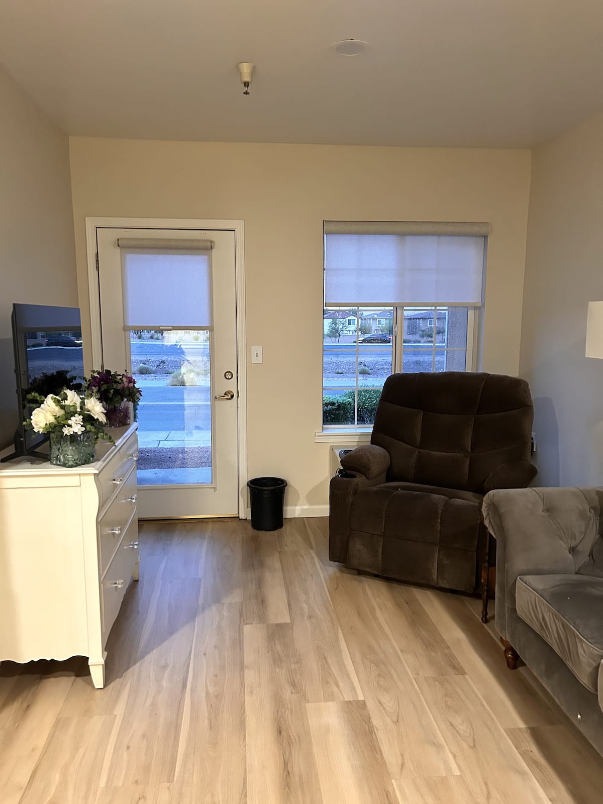 Roller shades in four windows inside country club