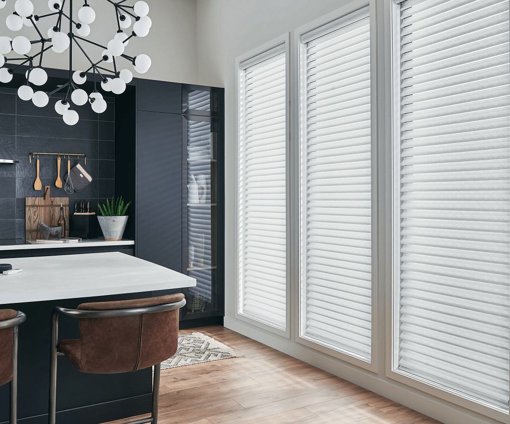 Elegant kitchen with full length windows and sheer pleated shades