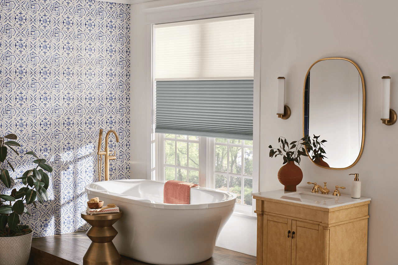 Modern cellular shades installed in a bright bathroom window, showcasing clean lines and light filtration