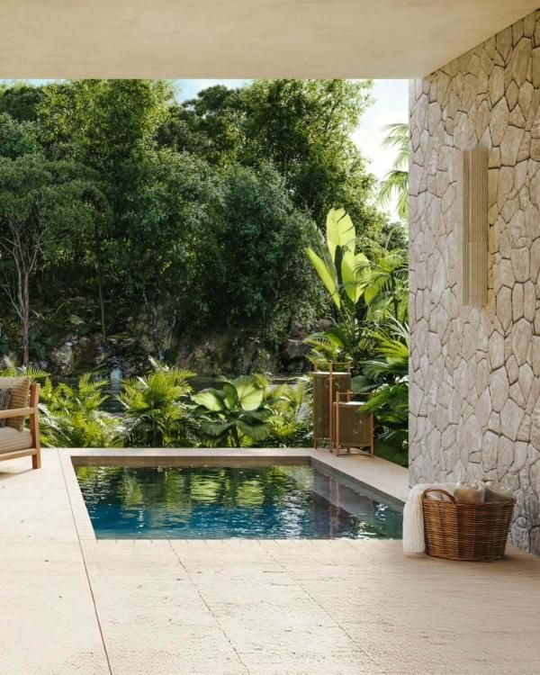 Piscine à débordement de l'Alila Mayakoba avec vue sur la lagune