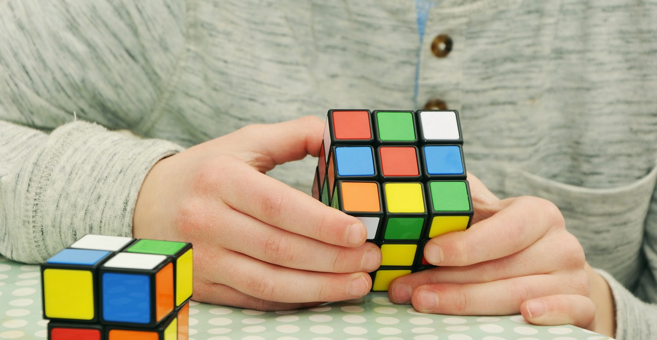 Speed cuber solving Rubik’s Cube in under 7 seconds.