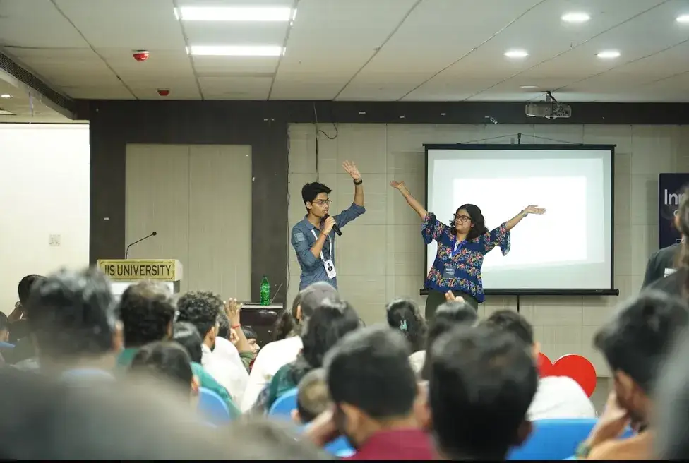Organiser Ayushman Bhattacharya and Speaker Sristhi Majumder on stage