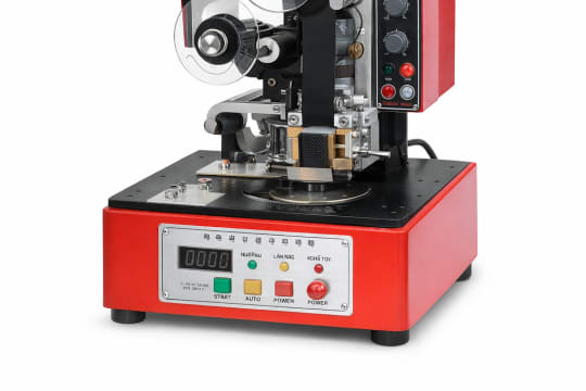 Máy in date trên lọ dạng mân xoay