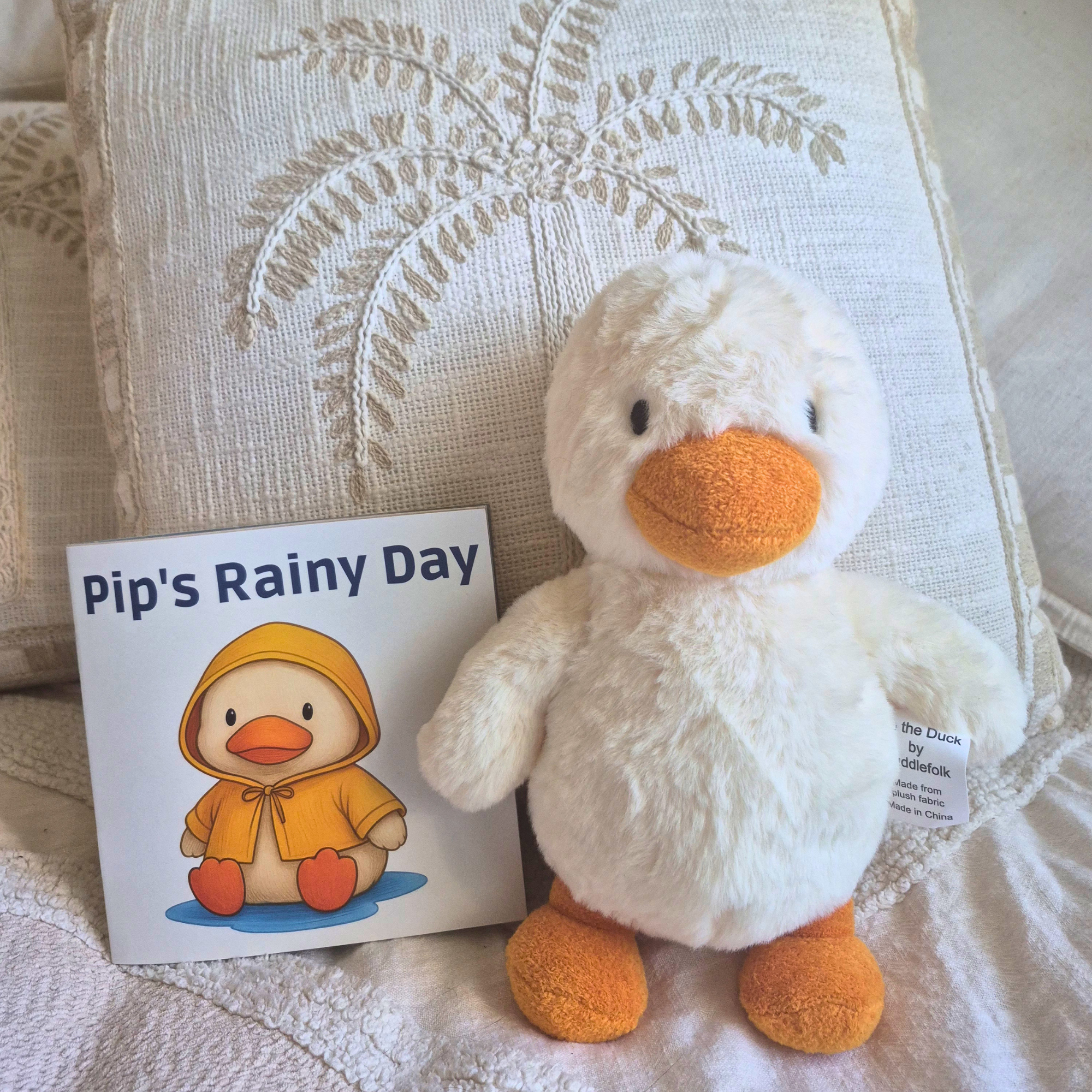 Pip the Duck plush with Pip's Rainy Day book