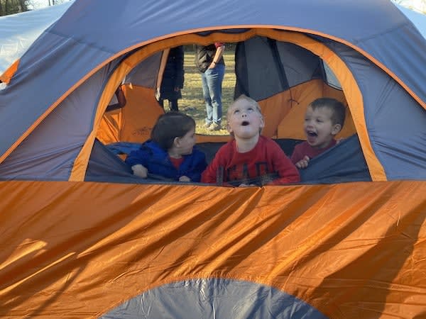 setting up backyard tent