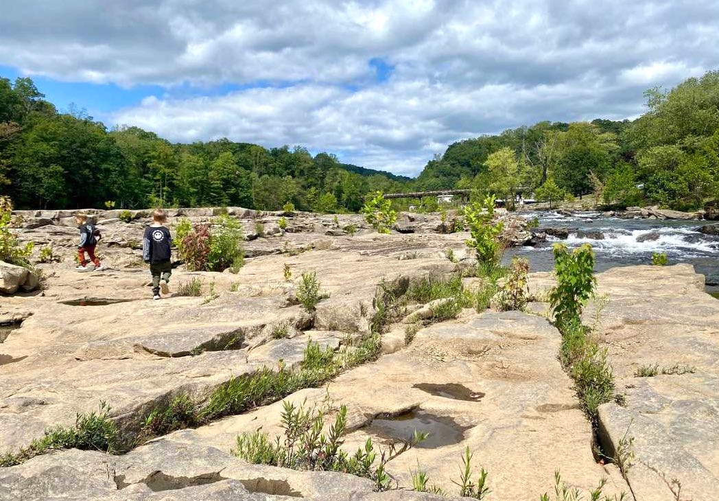Ohiopyle state park pa with two kids exploring the rocks