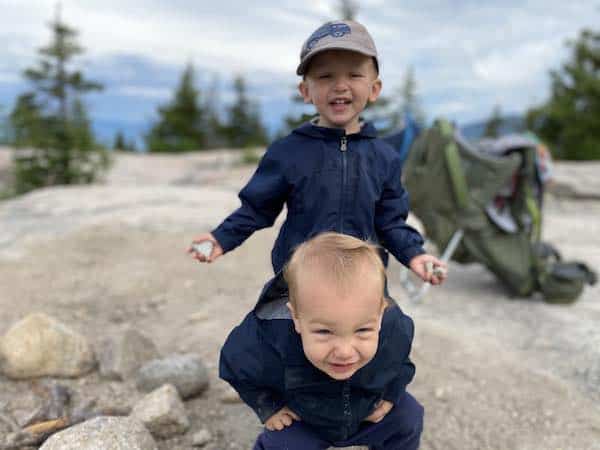 toddler boy hiking in rain jackets