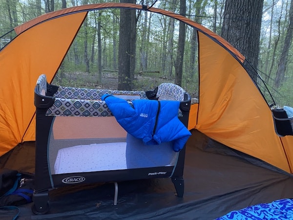 baby camping bed and wearable sleeping bag set up