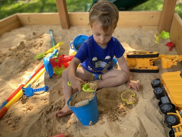 best outdoor toys for 2 year old: sandbox and sandtoys