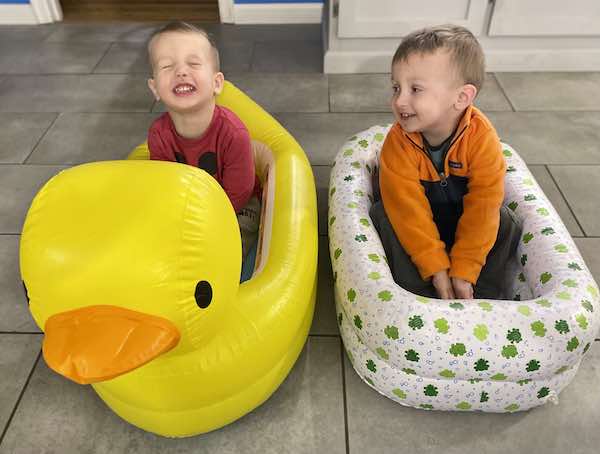 Two travel bathtub with my two sons