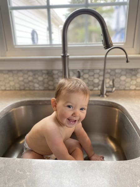 alternative to travel bathtub: kitchen sink