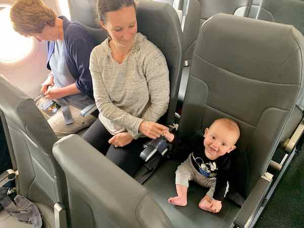 baby on airplane seat 5 months